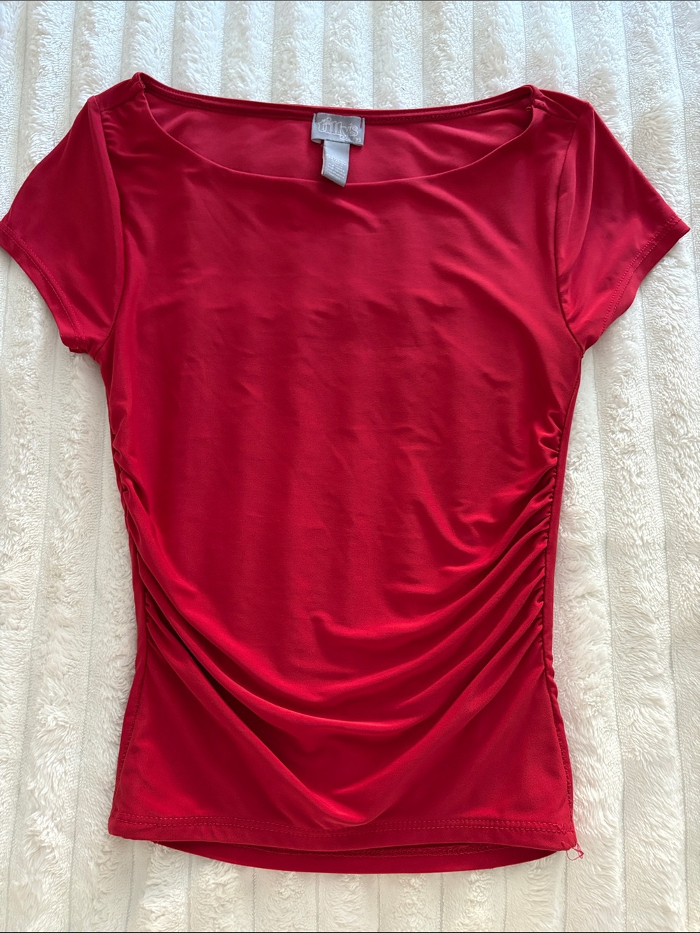 Tilly’s red tee